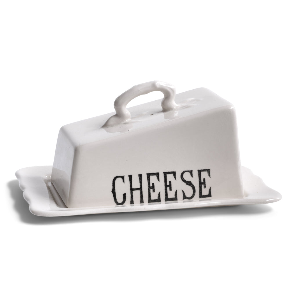 A generously sized 1920s Masons ironstone cheese dish consisting of base plate and cover, the cover with graphic black typeface "Cheese". Underneath the base plate reads "Masons Patent Ironstone England Guaranteed Permanent Acid Resisting Colours".