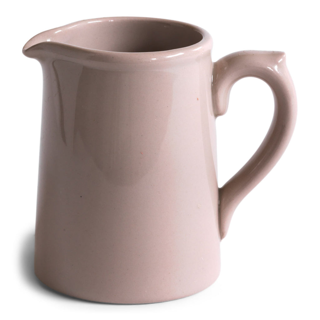 1920s stoneware cream jug glazed in a delicious dirty pink and with "Dudson Hanley England Vitrified Stoneware" stamped on its base.
