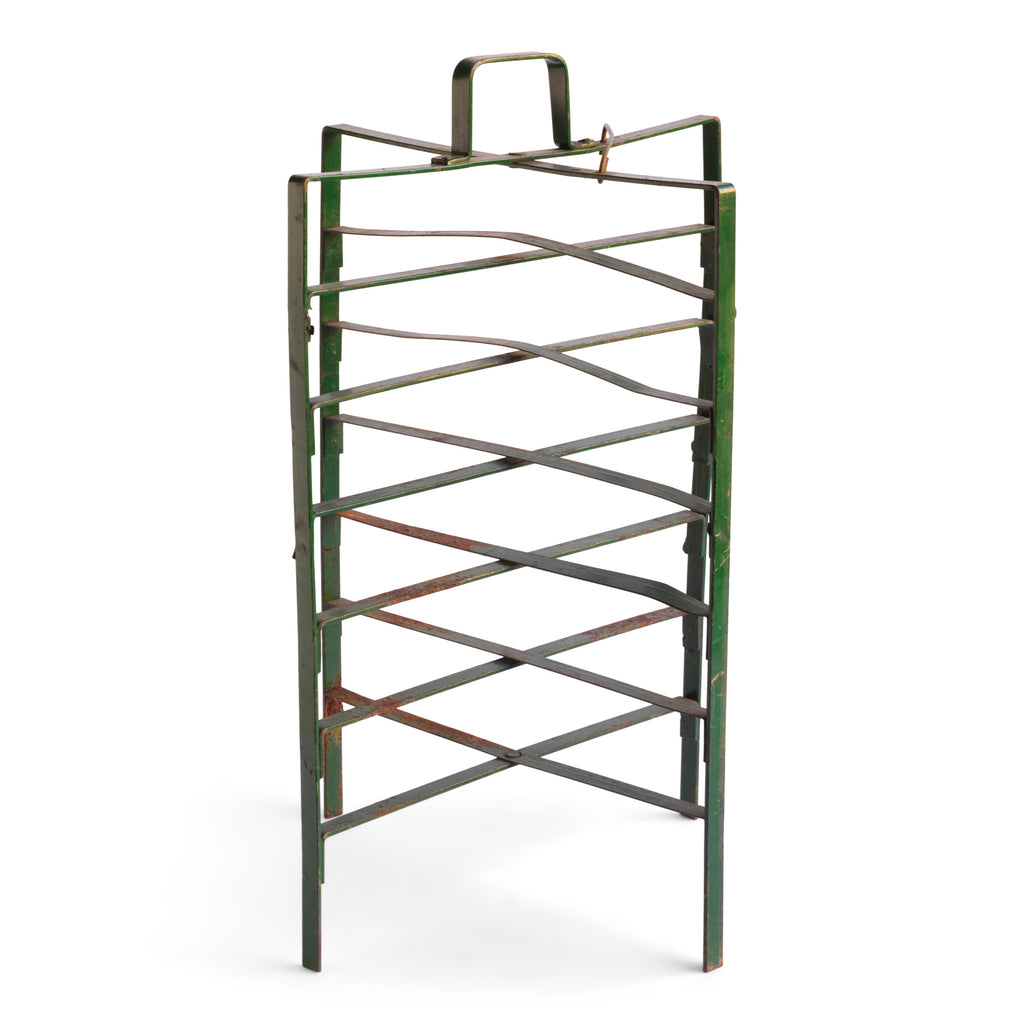 A free-standing vintage plate rack that holds either stacks or single plates on each of its six levels with handy carrying handle, and it also folds away when not in use. It could be used to either store or display plates.