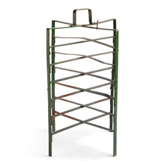 A free-standing vintage plate rack that holds either stacks or single plates on each of its six levels with handy carrying handle, and it also folds away when not in use. It could be used to either store or display plates.