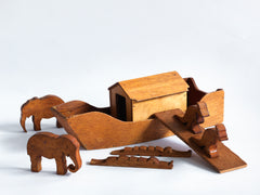 A vintage 1920s  scratch-built wooden Noah's Ark complete with animals, such polar bears, crocodiles, elephants, kangaroos, camels and lions, along with Noah and his wife. 