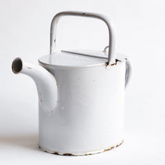 A handsome and downright useful early twentieth century antique white enamel water carrying can with a hinged lid.