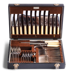 A good-looking silver plated 40 piece canteen of cutlery by Walker & Hall, Sheffield, c.1930, and in its original brown felt lined box.  The box's sections are each labelled: Table Knives; Cheese Knives; Table Forks; Dessert Forks; Dessert Spoons; Sugar Tongs; Tablespoons; Carvers; and Steel. The set is for 6 people. 