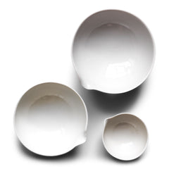 These perfectly formed vintage porcelain pouring dishes are the perfect kitchen-to-table vessels for olive oil, sea salt and crushed black pepper. Once used in a chemist's laboratory, these crucibles are now perfectly suited for condiments at the dining table. 