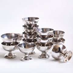 A collection of vintage silver plated ice cream coupes, some ex hotel and others ex officer's mess.