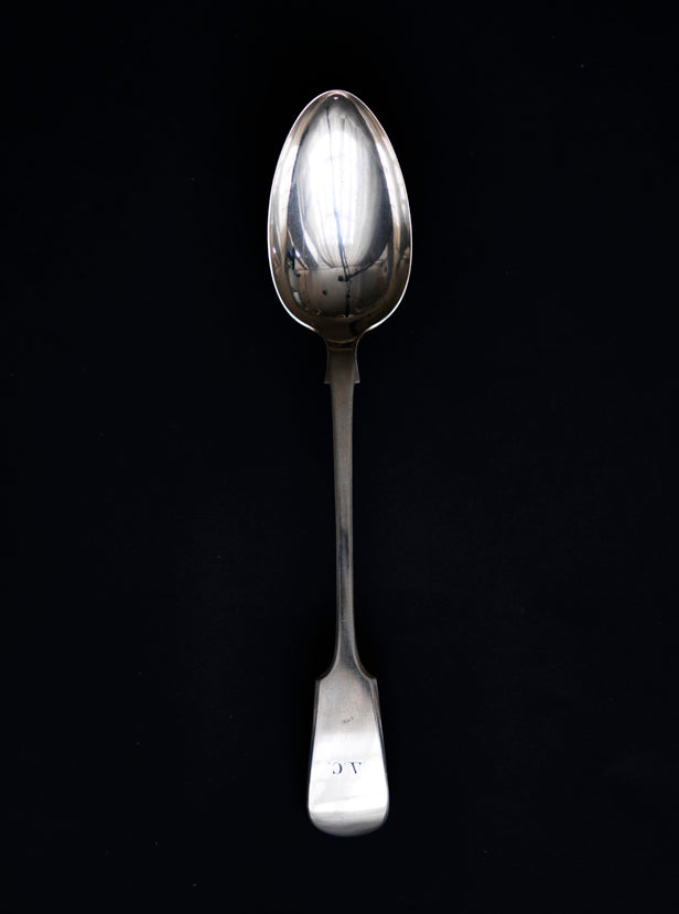 large Edwardian silver-plated serving spoon with A C monogram and fiddle handle