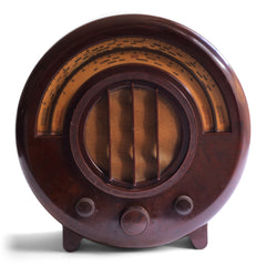 A magnificent and superb condition EKCO AD-65 radio with Bakelite case, designed by celebrated architect Wells Coates in 1932, and manufactured by E.K.Cole Ltd. from 1934.