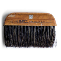 Once used a wallpaper brush, this handy little brush is just at home being used in conjunction with dustpan or as a tabletop crumb brush.  Origin: UK  Date of manufacture: 1950  Material: pure bristle and wood  Length 20cm Width 13cm Depth (thickness) 3cm  Condition: good, with time-worn patina that comes with decades of use.