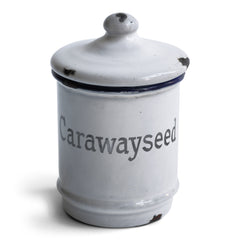 A rare and charming little enamel caraway seed canister with grey typeface, blue rim and original lid.  Year of manufacture: c.1930  Origin: England   Material: enamelware  Height: 10.5cm  Diameter: 7cm