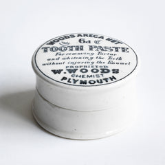 We have sourced a small collection of Victorian chemist's tooth paste pots with lids.  Each lid is exquisitely designed and bears all of the proprietor's information in black and white: "Woods Areca Nut 6d Tooth Paste - For removing Tartar and whitening the Teeth without injuring the Enamel. Propretor W. Woods Chemisy Plymouth"