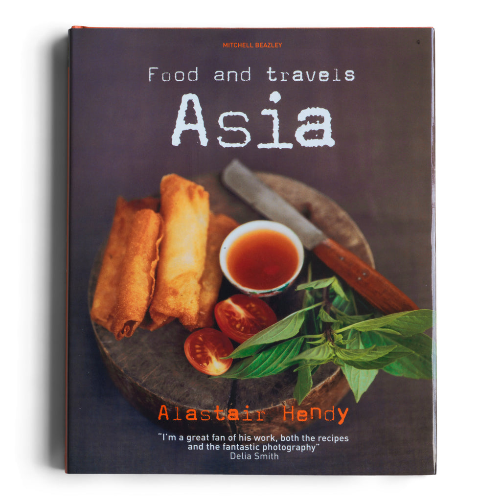 Food & Travels Asia by Alastair Hendy with over 100 back-home do-able dishes, that celebrate the food, lives and worlds of generations of Asian home cooks, from the classics, such as Hanoi chicken noodle soup, Dim sum ribs, and Hill station curry; to the more exotic - Burmese Green ginger river prawn curry, Mandalay Hill noodles and Lime and chilli butter clams; and from the houses of the spiritual, Laos Aubergine with sweet chilli shrimp sauce, Mount Popa green papaya salad, and Balinese Temple rice.