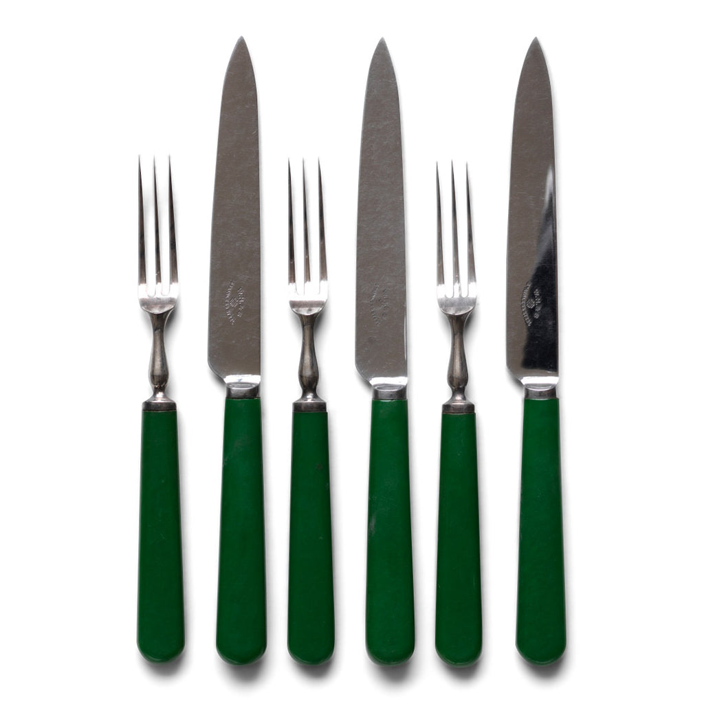 A set of 6 fruit knives and forks - consisting of 3 knives and 3 forks with green Bakelite handles, each blade marked W H & S.