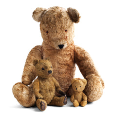 A collection of antique and vintage British-made teddy bears, dating from the 1930s and the 1950s.