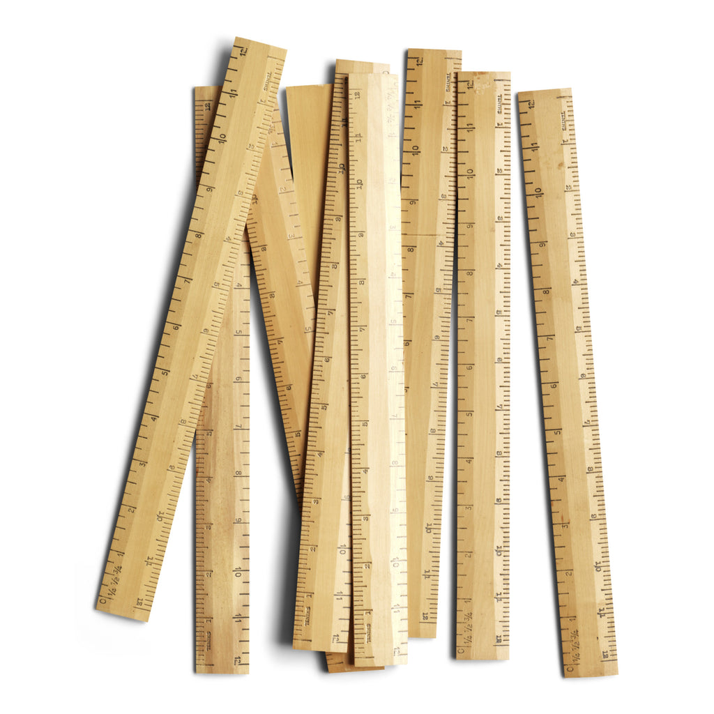 We have sourced a collection of vintage 1960s wooden rulers, each marked in imperial inches.