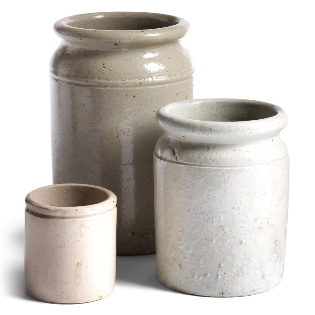 Our antique utility jars are stoneware, over 100 years old, and were originally made by the Victorians to hold marmalade and other preserves. They have a rounded lip and come in a wonderful blend of greys, buffs and mushroom browns, and all make great holders for all your scullery bottle brushes, long-handle dish scrubbers, utensils and other bits and bobs.
