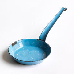 A miniature white speckled blue enamel twin-handled gratin dish or baking dish, and a frying pan; part of an extensive collection of miniature pale blue enamel kitchen ware, previously owned by the miniaturist specialist and collector extraordinaire Joan Dunk.