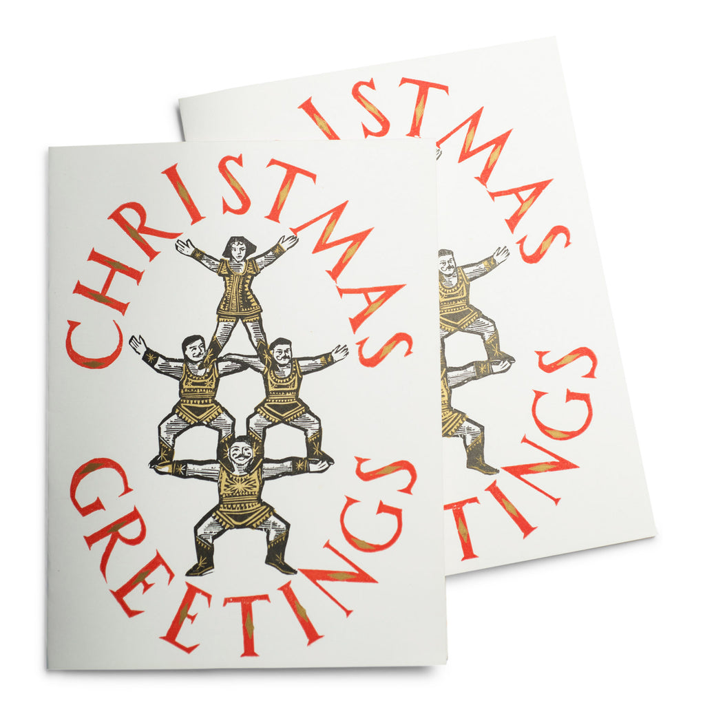 Vintage acrobat Christmas card. We have sourced a small quantity of these very rare large original hand block-printed vintage Christmas cards.  Design no.12 is of four acrobats encircled by Christmas Greetings and was designed by Robert Lobley, and printed at The Magpie Press in the 1960s.  This beautiful handmade card is unique to our store and is the ideal Christmas gift in itself - no one else will have one!