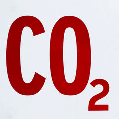 A striking mid twentieth century fire-fighting enamel sign in white and red with bold CO2 lettering and good graphic shape.