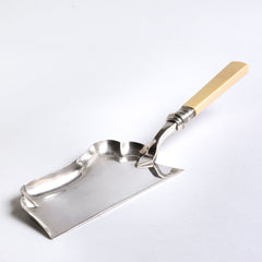 Edwardian silver-plated crumb tray with ivorine handle