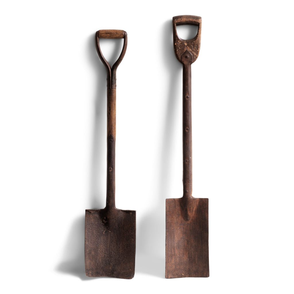 A pair of vintage garden spades, that most likely date to the 1920s.