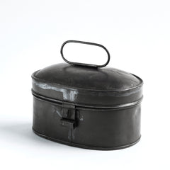 A charming little Victorian spice tin of oval form with hinged lid and carrying handle, and with original painted finish. We think it would make a wonderful tea caddy. Country of origin: UK Date of manufacture: c.1890 Material: tin Dimensions: Length 17cm Depth 12cm Height 10cm Condition: excellent
