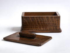 A very pleasing and handy little 1930s tabletop oak box with lid. It has a baize covered underside and so will sit comfortably on your desk or worktop.