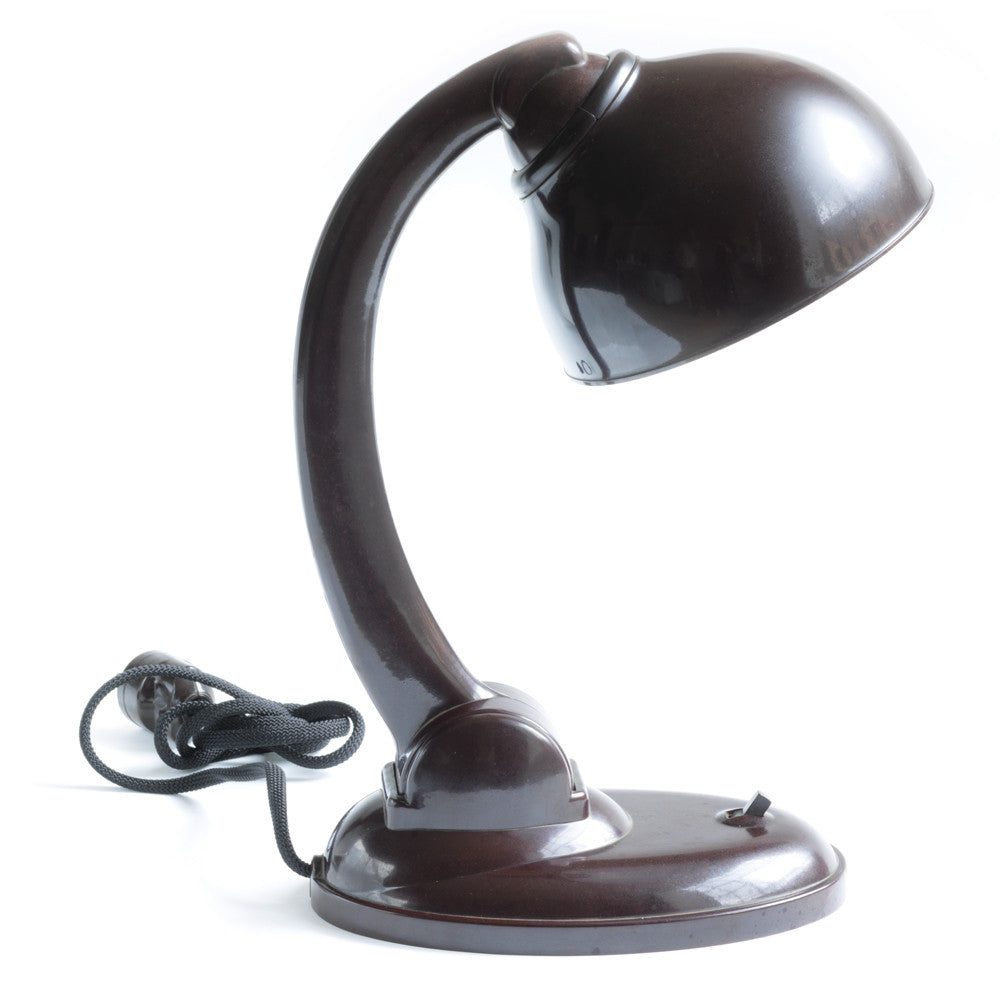 A rare 1930s all-Bakelite lamp designed by British designer Eric Kirkman Cole. It has a pivoting arm and adjustable shade for directional lighting making it ideal for the desk or the bedside table. 