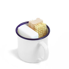 Our bathroom set consists of a nail brush and a bar of our utility soap all neatly tucked into our white enamel mug makes for a thoroughly useful gift.  The mug is ideal for holding your toothbrush and toothpaste - or for that night-time drink of water - and will make a smart addition to your bathroom.