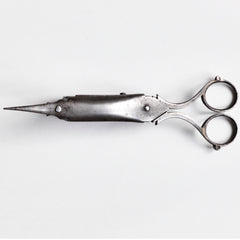 A Georgian polished carbon steel candlewick trimmer with a beautifully crafted and fully working extinguisher box.