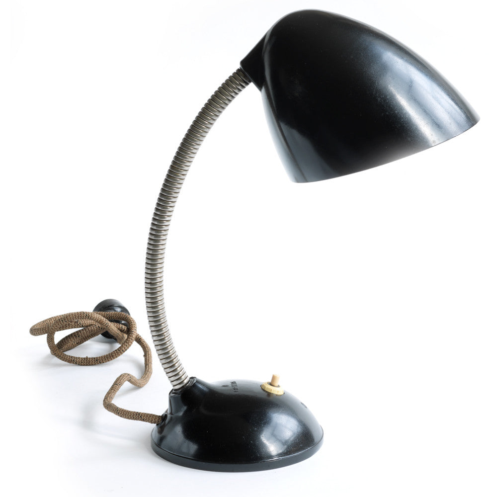 A stunning 1940s Bakelite lamp with flexi-arm designed by British designer Eric Kirkman Cole. It emits good directional light and so is ideal for the desk or the bedside table.