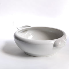 A good large early twentieth century ironstone dairy pouring bowl with roll-top rim and cupped handle by Grimwade, marked to the base 'The "Grimwade" Safety Milk Bowl. 