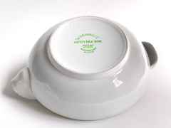 A good large early twentieth century ironstone dairy pouring bowl with roll-top rim and cupped handle by Grimwade, marked to the base 'The "Grimwade" Safety Milk Bowl. 