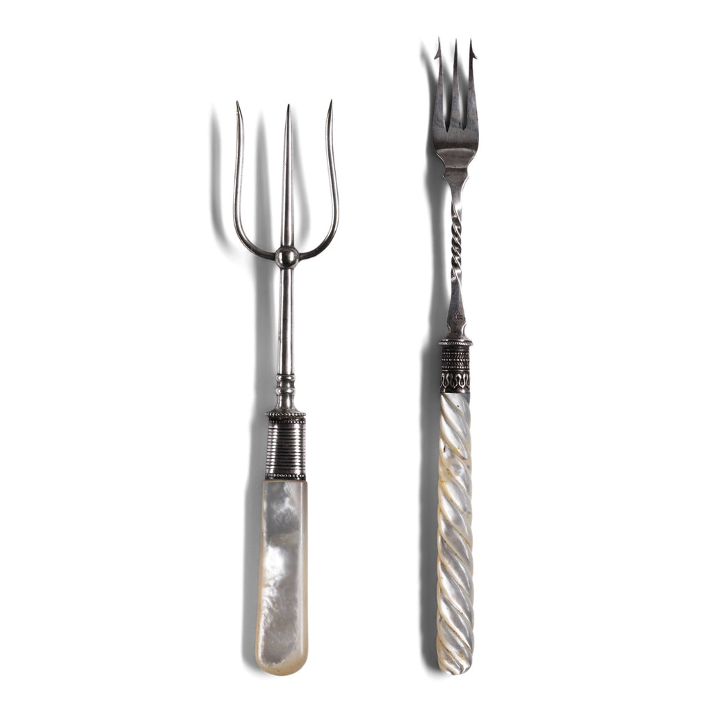 An antique bone handle bread fork and pickle fork, both with Stirling silver mounts and silver plated tines. The bread fork has a plain mother of pearl handle, the pickle fork has  carved barley-twist mother of pearl handle.