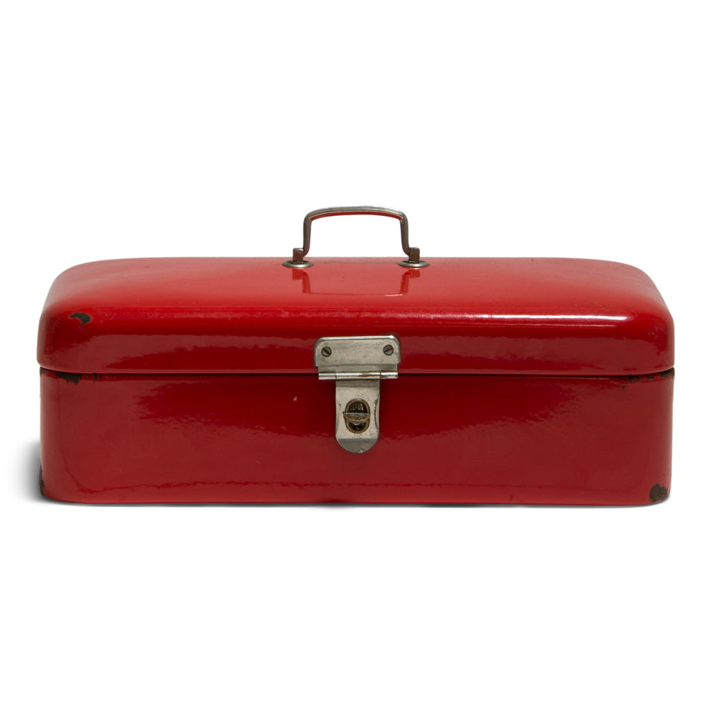 A striking scarlet red enamel bread box with hinged lid, carrying handle and fastening hasp. The hinges, handle and hasp are all nickel plated, and the interior of the box is finished in white enamel.