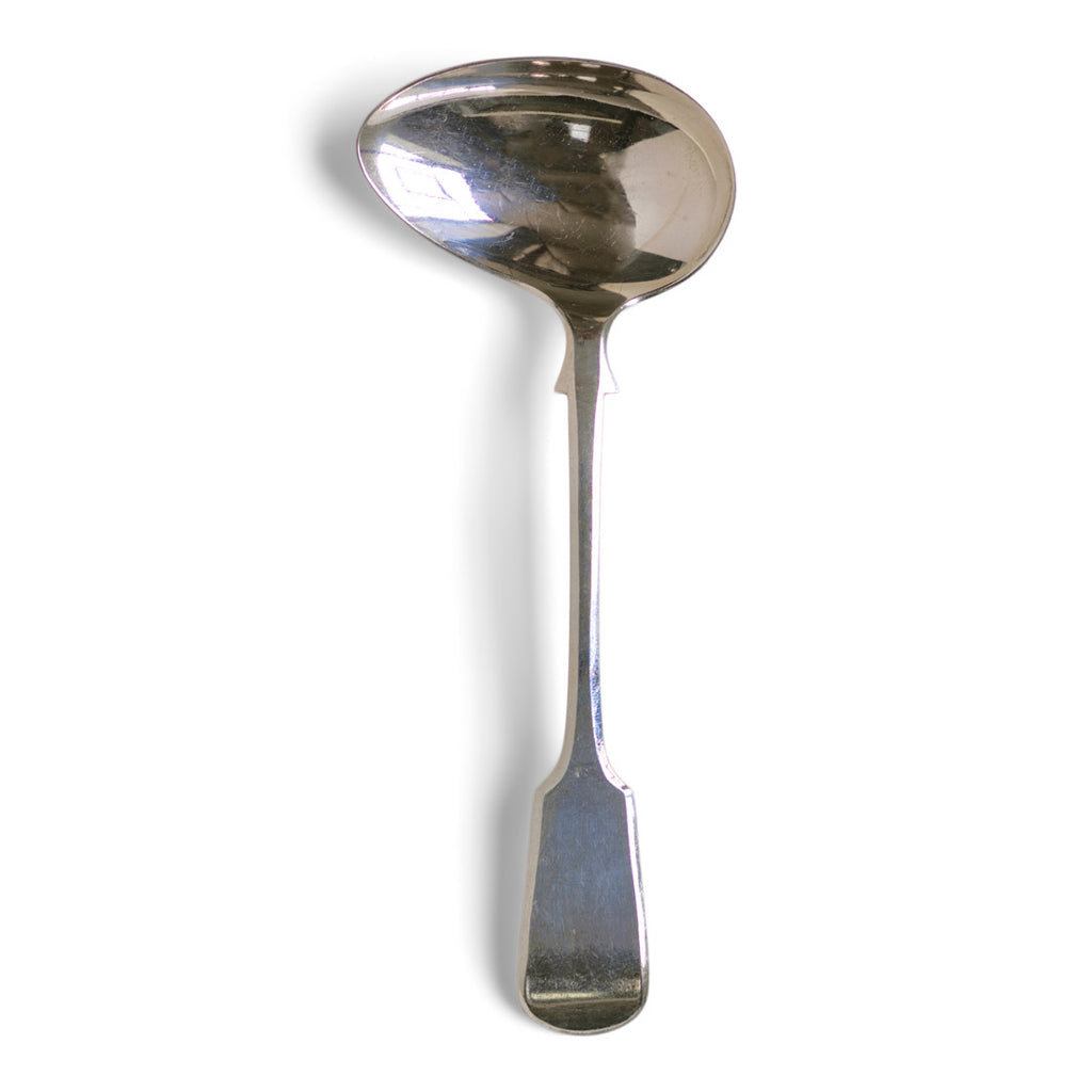 A vintage silver plated sauce ladle with fiddle handle with elegant oval-shaped bowl designed to assist in accurate pouring of sauces and gravy. Our vintage silver-plated EPNS (electro-plated nickel silver) ladles are both good-looking and functional, and their renewed popularity make them a cool addition on the table.