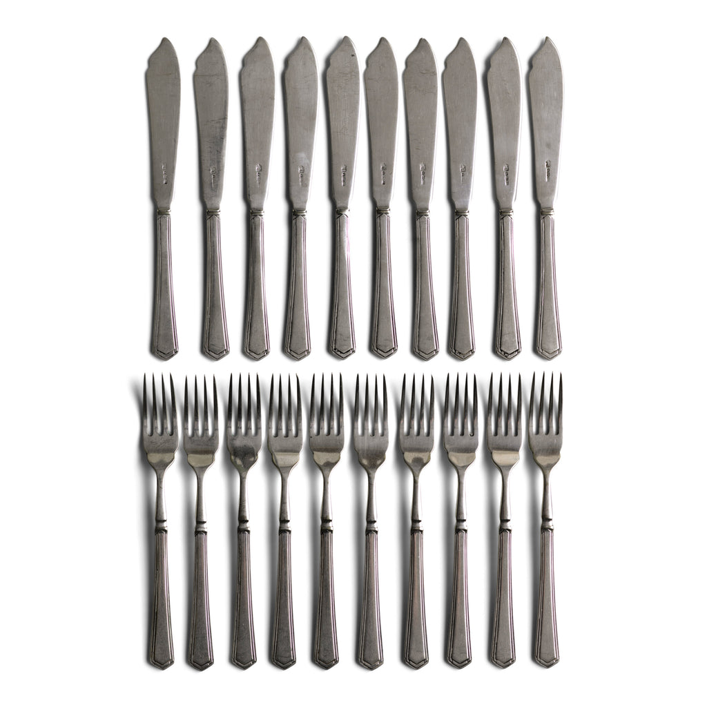 Set of twenty vintage Art Deco silver-plated fish knives and fish forks These well designed fish knives and forks knives have silver plated blades and silver-plated handles, the flared handles end with a classic 1930s Art Deco motif. 