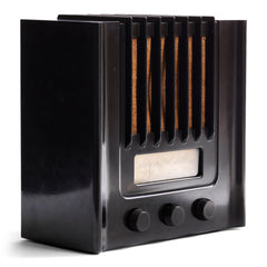 The British Murphy 4 valve AD 94  radio with distinctive Art Deco black Bakelite cabinet was manufactured from 1940.  Looking like a modernist building, this pioneering architectural style  radio resembles a powerhouse of electronic communications. Its streamline, futuristic mirrors  the Machine Age of the late 1930s.