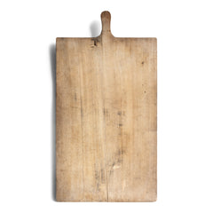 A rustic antique vintage chopping board with a beautiful time-worn, knife-cut patina, full of character and warmth.