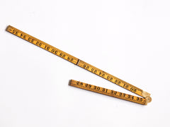 Vintage carpenters rule with brass hinge