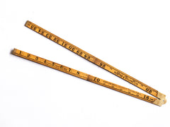 Vintage carpenters rule with brass hinge