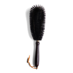 A handy brush with an oval bristle arrangement, and excellent for dealing with all those awkward nooks and crannies around the home. It has a polished painted wood handle, and handy hanging loop - and was made by "Kleen-e-ze" in the 1930s. 
