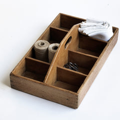 A well proportioned polished-pine housekeeper's tidy with integrated handle and a lovely time-worn patina. It could also be used as an open tool box for tools, screws, nails, drill and all those bits and bobs you need for DIY around the home. It is also excellent for artist's materials or could act as a shoe cleaning box. In fact it's totally purposeful.