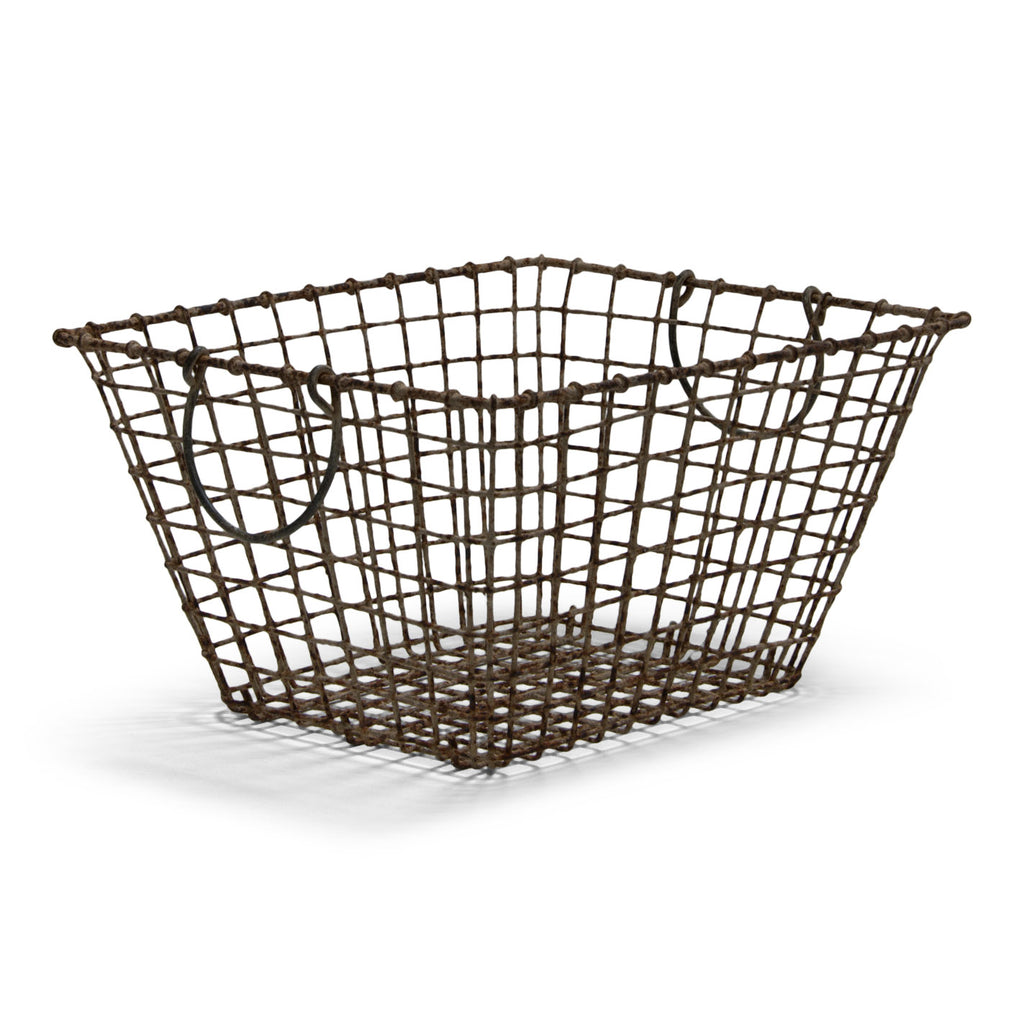 French oyster baskets constructed from heavy-duty wire and with swing loop handles for carrying - they make a stunning fireside basket for the easy access of kindling or small logs, and are great for holding magazines and newspapers.