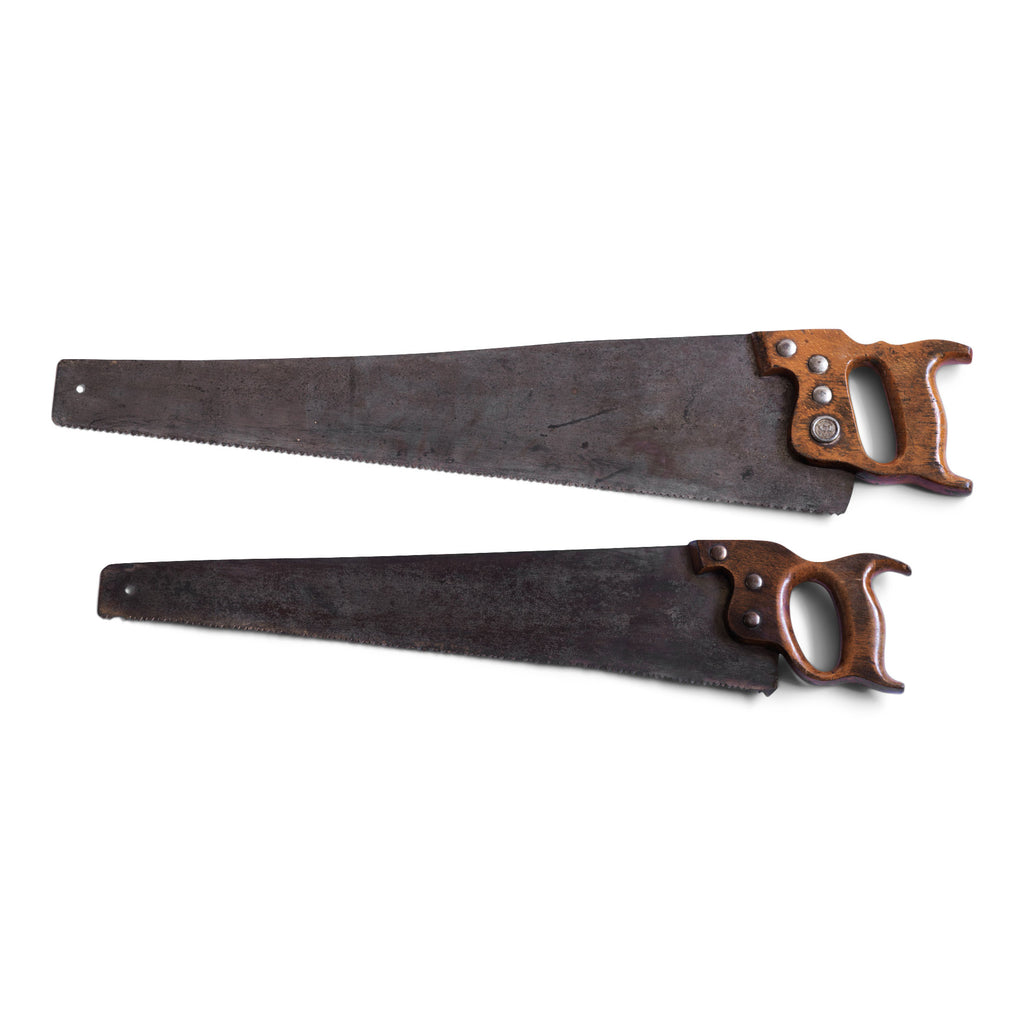 Two vintage panel saws with polished oak handles