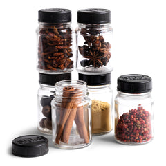 Our glass jars have Bakelite lids, and each is moulded with the name "Sidol". The jars make perfect spice containers and look very pleasing when grouped together. 