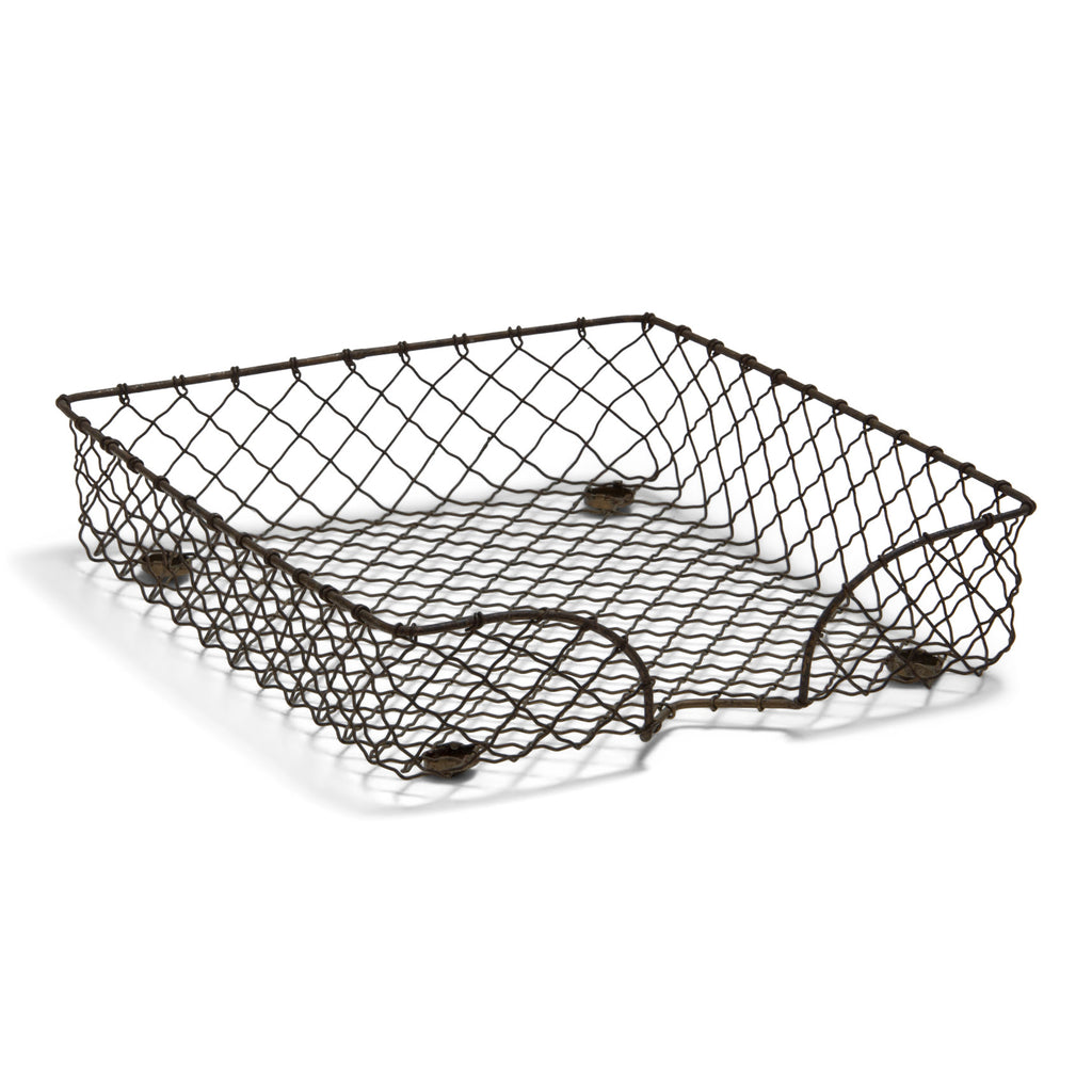 A vintage wire desk in-tray