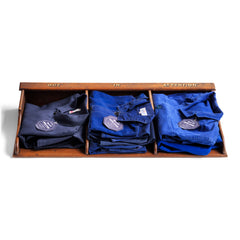 A collection of cobalt-blue, denim-blue and grey cotton vintage French work jackets.