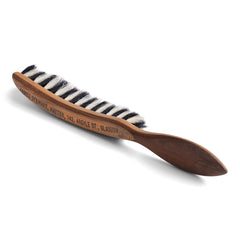A good-looking early twentieth century hatter's advertising brush made from beech wood and twin-tone horsehair, arranged like a zebra's mane. The brush bears the proprietors name and address "James Stewart, Hatter, 142, Argyle St, Glasgow", and was probably given away to regular customers.