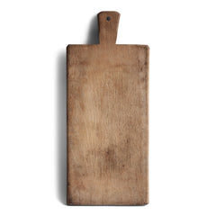 A charming vintage chopping board with handle and hanging hole. Its time-worn surface has a wonderful patina. Our boards also make excellent communal serving platters for air dried ham, antipasto, breads, cheeses, pickles and bread; and when not in use, look great as a backdrop when propped up on the kitchen side.