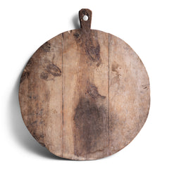 A rustic antique vintage chopping board with a beautiful time-worn, knife-cut patina, full of character and warmth.